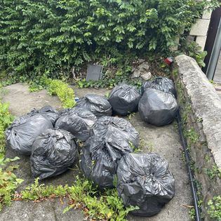 black bags removed and swept before